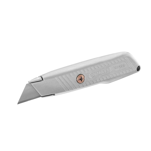 Photo of STANLEY 0-10-299 utility knife with metal body, exposed blade, and textured grip, side angle.