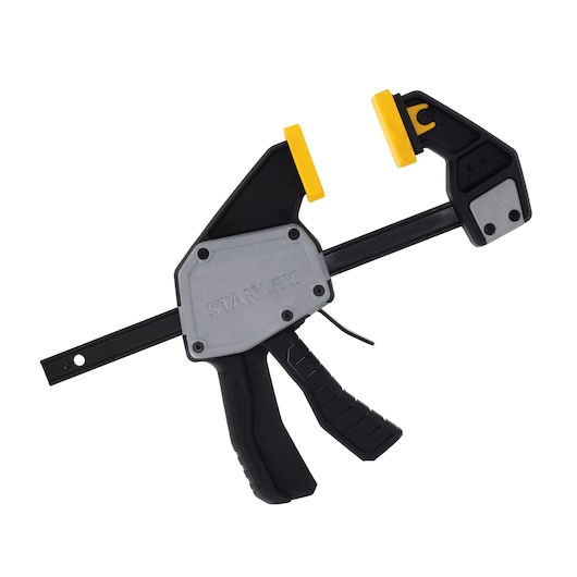 Photo of STANLEY FMHT83273-0 quick-release bar clamp, black and yellow, side view on white background.