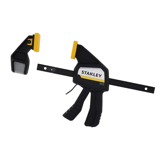 STANLEY FMHT83273-0 photography of black and yellow trigger clamp, side angle on white background.