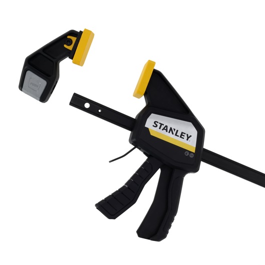 STANLEY FMHT83277-0 photography of black and yellow trigger clamp, angled, on white background.