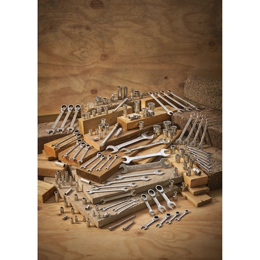 STANLEY FMMT13037-0 photography of assorted wrenches and sockets displayed on wood blocks.