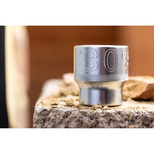 Stanley FMMT17216-0 socket tool, close-up on textured surface, silver finish, photography product.