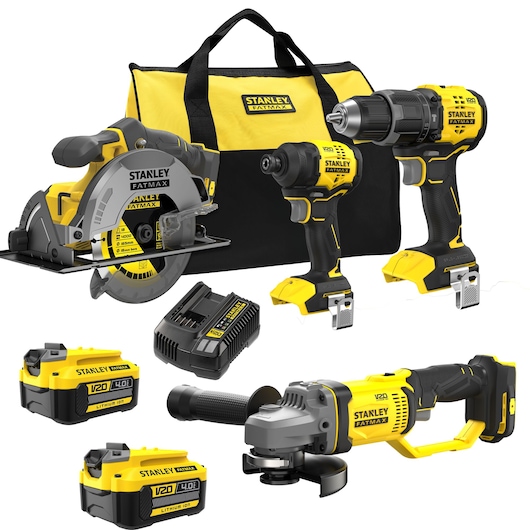 STANLEY SFMCK459M2S cordless power tool kit with yellow and black bag, saw, grinder, drill, impact driver, charger, and batteries.