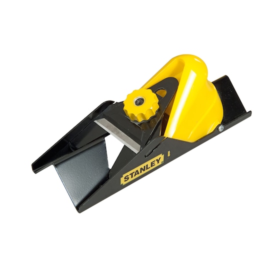 Stanley block plane tool with yellow knob and black metal body for woodworking.