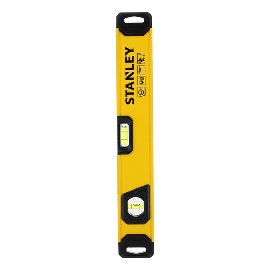 A yellow Stanley spirit level with black end caps and visible vials for horizontal and vertical leveling.