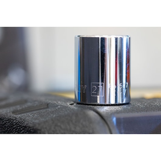 STANLEY STMT86104-0 chrome socket, 27mm, close-up angle on black surface, Photography category.
