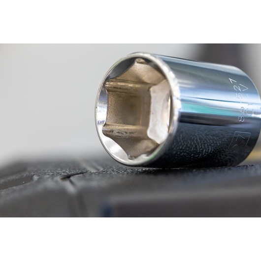 STANLEY STMT86106-0 chrome socket tool close-up angled on a black surface, photography product.
