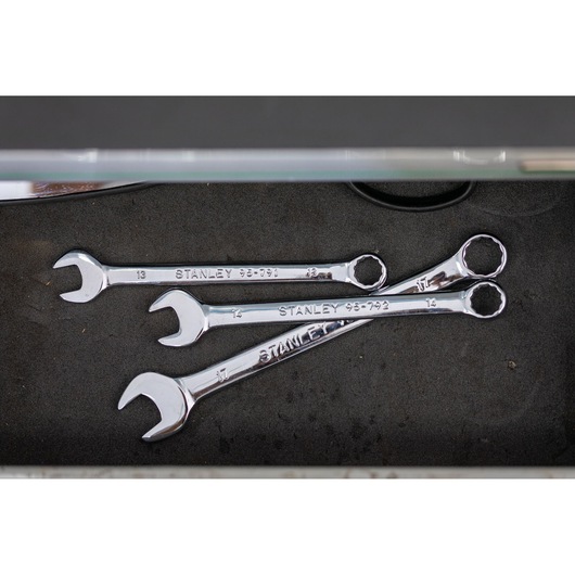 Photo of three STANLEY STMT95790-0 combination wrenches in a drawer, chrome finish, product photography.