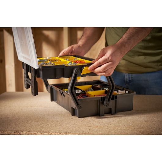 STANLEY STST1-75540 organizer box with yellow compartments, shown open on a workbench.