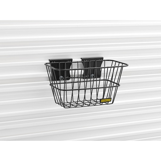 STANLEY STST82603-1 wire storage basket mounted on white wall, front angle.