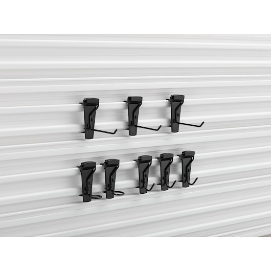 STANLEY STST82617-1 wall-mounted black hook set for tool storage, side angle on white panel.