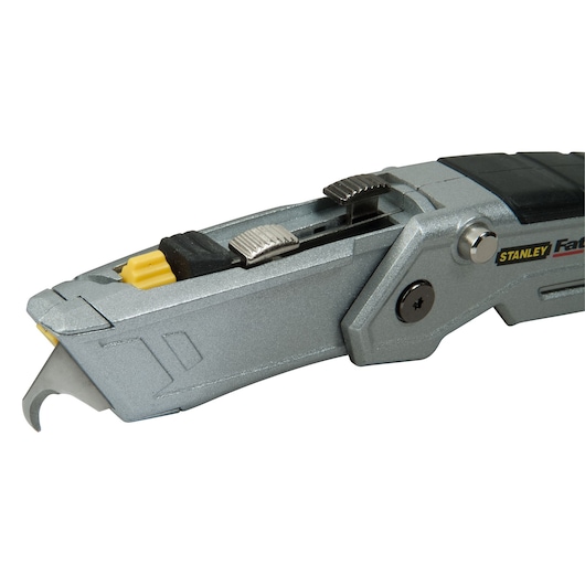STANLEY XTHT0-10502 utility knife side view showing blade and lock mechanism, silver and black finish.